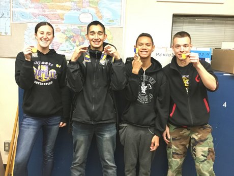 L to R:  Emily Williams, Aaron Dorfmeier, Thomas Snell, Brandon Pridgen.  Members of the NJROTC air rifle team.